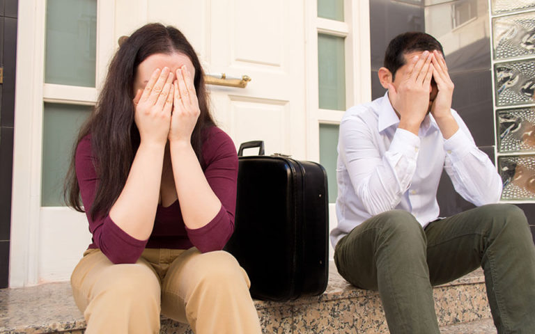 main-embarrassed-couple-locked-out-of-house