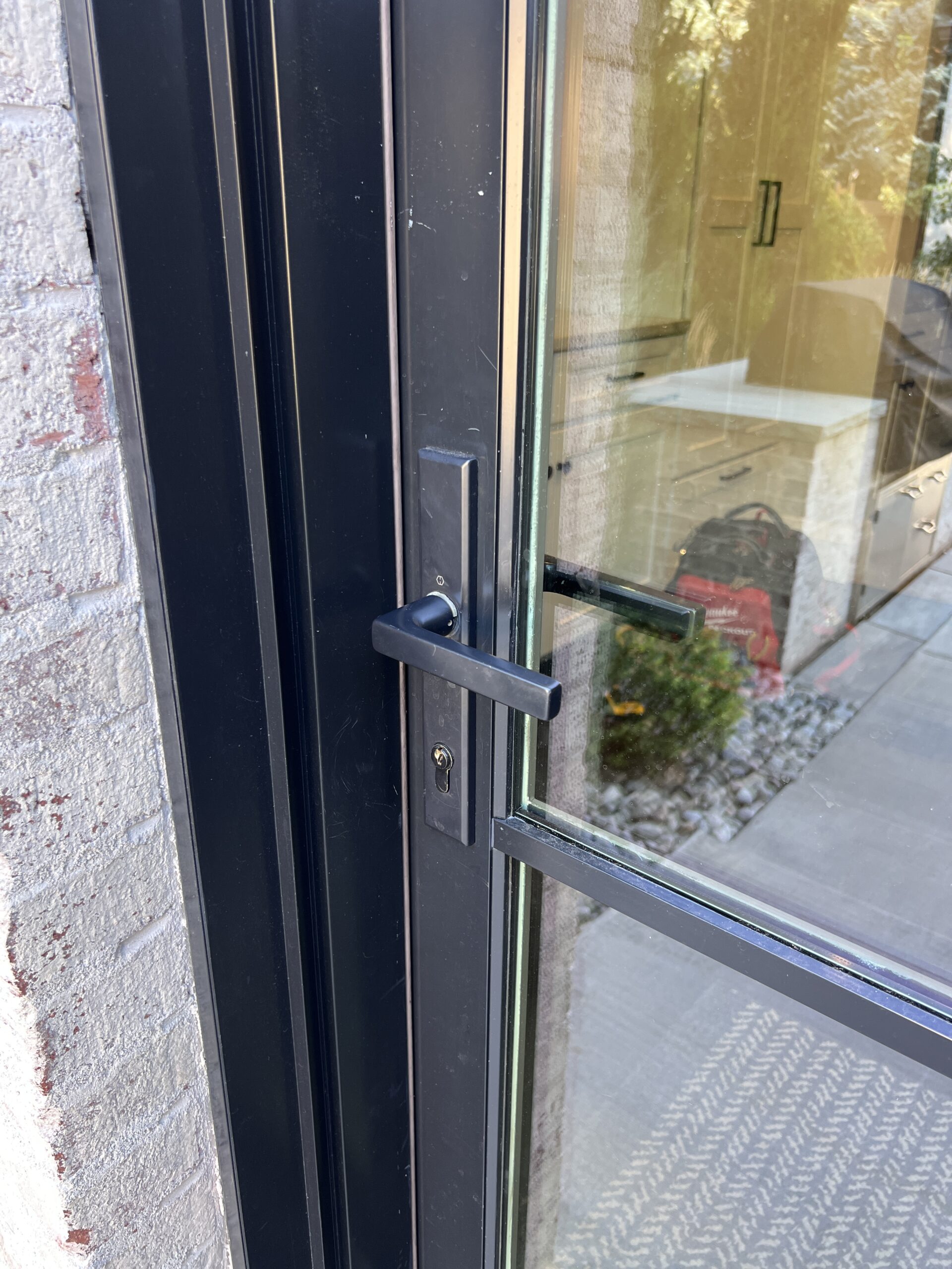 Multipoint lock strike plates and frame alignment points beside the door edge
